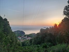 Sonnenaufgang hinter dem Leuchturminselchen Palmaiola